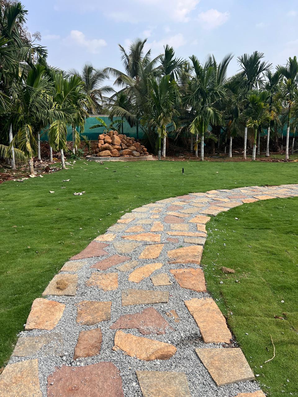 Expansive lawn with bamboo fence